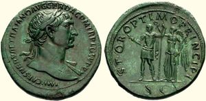 Траян и венчающая его аллегория победы с надписью «сенат и римский народ лучшему принцепсу» (реверс). Бронзовый сестерций.