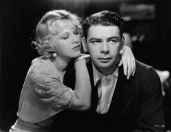 С Глендой Фаррелл в фильме «Я — беглый каторжник» (1932)