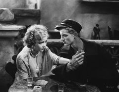 Хелен Твелвтрис и Филлипс Холмс в фильме «Её мужчина» (1930)