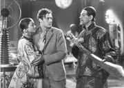 Мирна Лой, Чарлз Старрет и Борис Карлофф в фильме «Маска Фу Манчу» (1932)