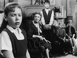 В роли миссис Лили Мортар в фильме «Детский час» (1961)